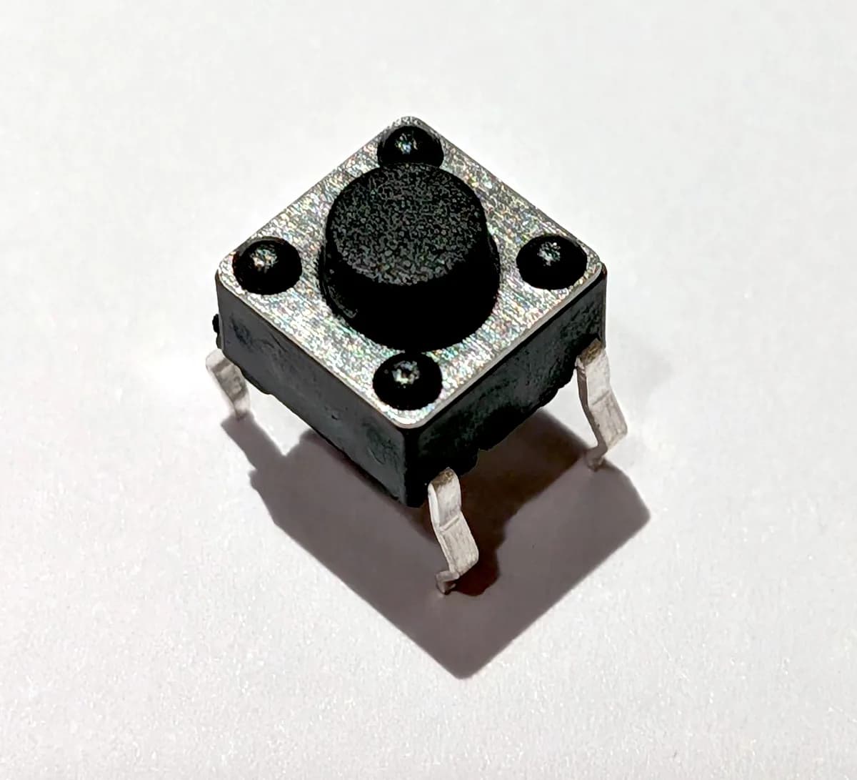 Tactile switch button, top side