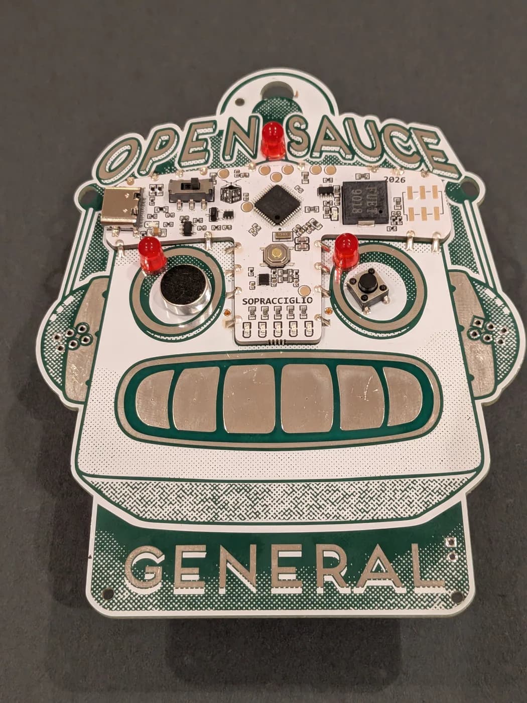 Three LEDs inserted from the front of the badge
