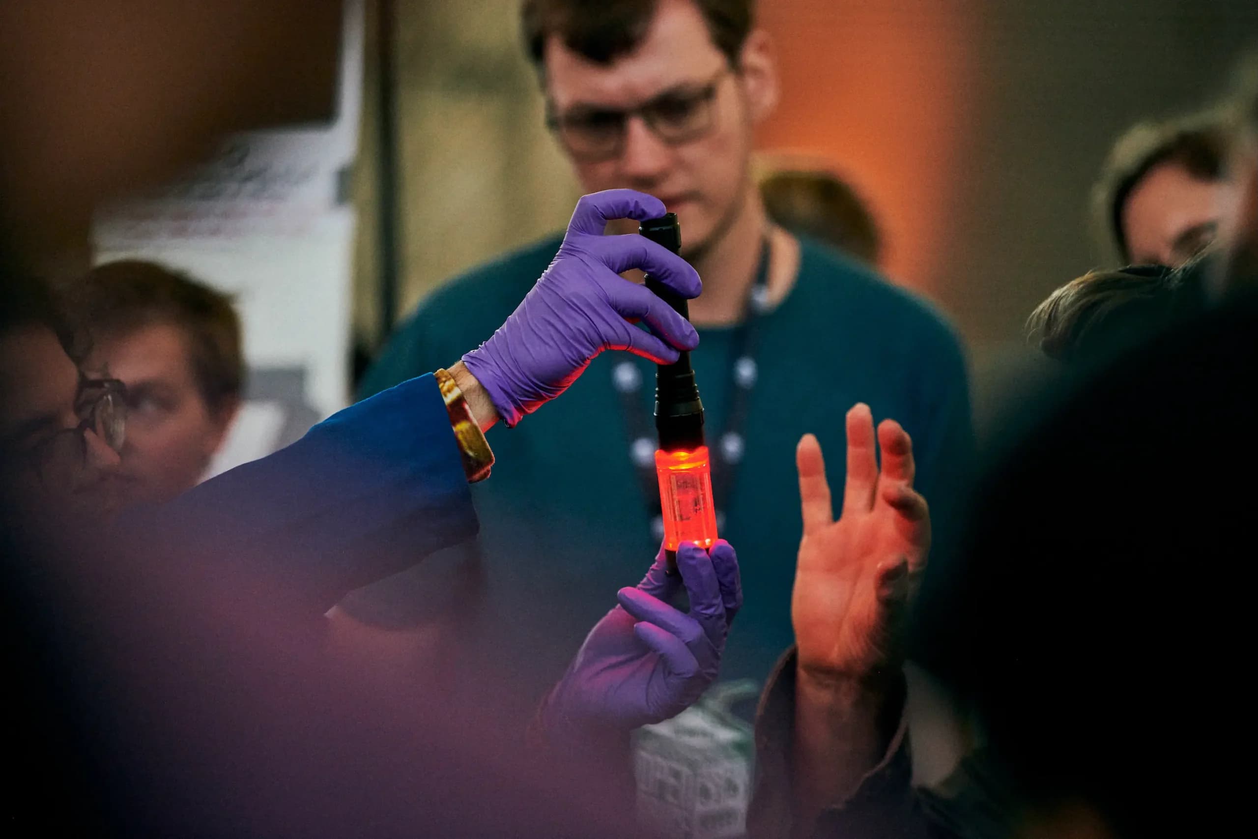 A glowing exhibit demo at Open Sauce